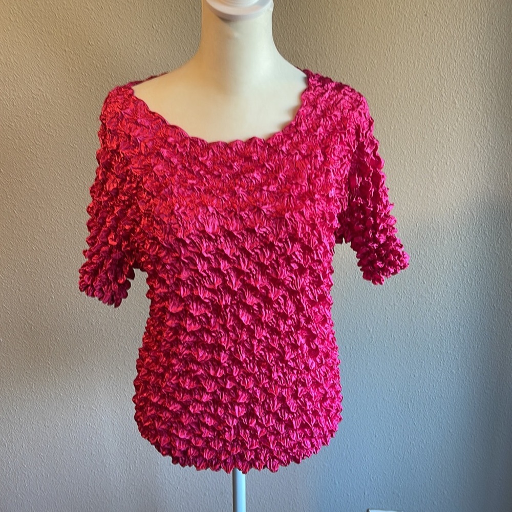Pink crinkle top quarter sleeves.
